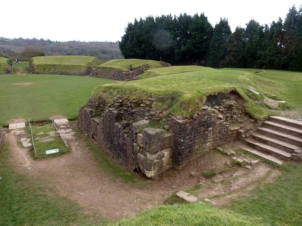 Ruins of the Roman amphitheatre of Caerleon, where Guinevere allegedly lived out her days as a nun according to Geoffrey of Monmouth. Photo by Rob Farrow, CC-BY 2.0