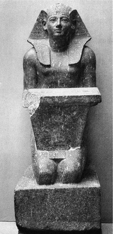 Kneeling statue of Amenhotep II holding offering table